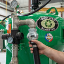 Compressed air hose being connected to the air inlet Crowfoot coupling on the DB500 or DB800